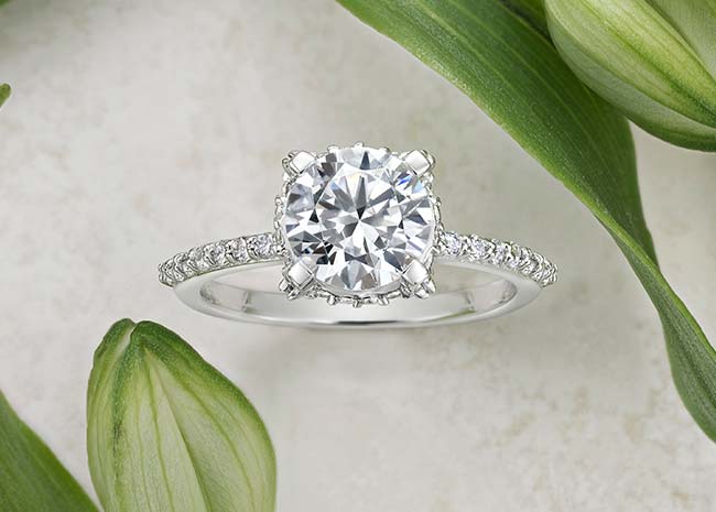 Beautiful engagement ring design on stone background