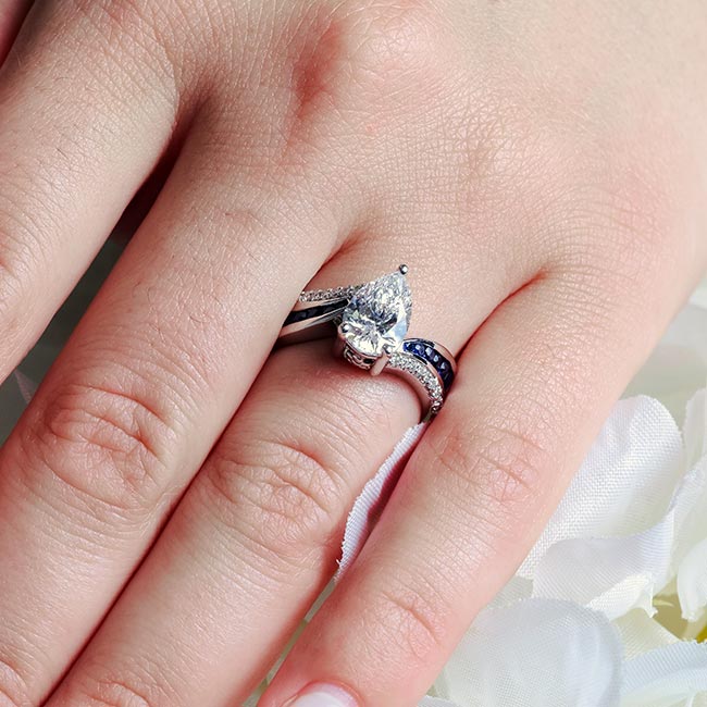Platinum Blue Sapphire Accent Pear Shaped Lab Diamond Ring Image 4