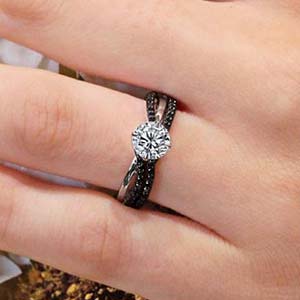 Unique black diamond bridal set on a hand