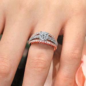 Woman wearing a two tone diamond engagement ring